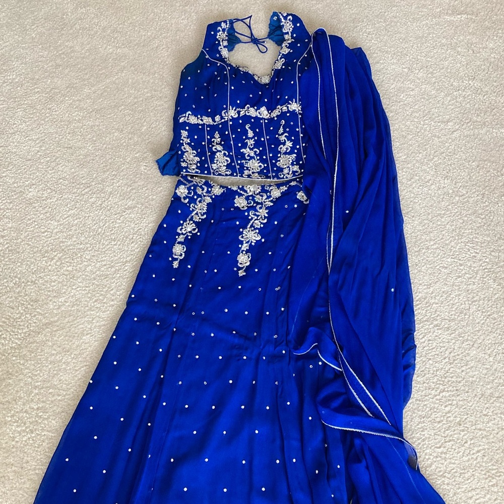 Gently used Royal Blue and Silver lehenga set.